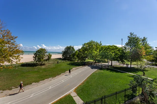 a front view of a building with street view