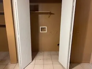 a close view of water heater refrigerator washer and dryer