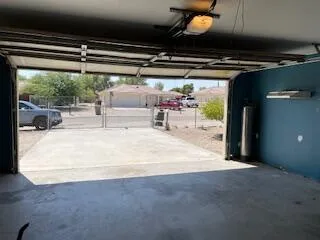 a view of water heater and a garage