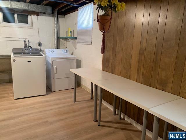 279 Slocum Way Fort Lee, NJ 07024 - Photo 18 of 20 a view of a hallway with washer and dryer