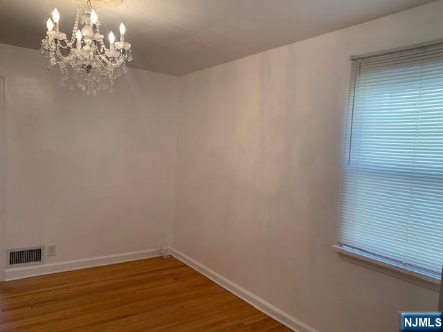 279 Slocum Way Fort Lee, NJ 07024 - Photo 7 of 20 a view of a livingroom with wooden floor