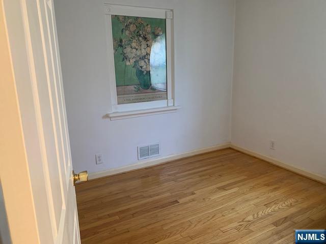 279 Slocum Way Fort Lee, NJ 07024 - Photo 10 of 20 a view of a room that has a window in it