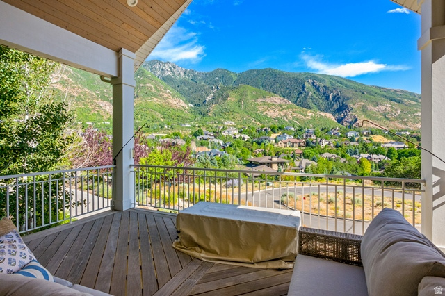 3 Carriagewood Cove, Unit 1088 Sandy, UT 84092 - Photo 7 of 79 Expansive outdoor deck featuring wood-finish flooring and a white railing system