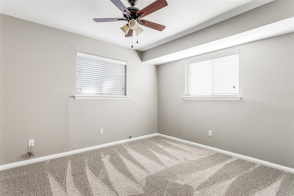 845 Lovers Lane Grapevine, TX 76051 - Photo 15 of 24 a view of a bedroom with a window