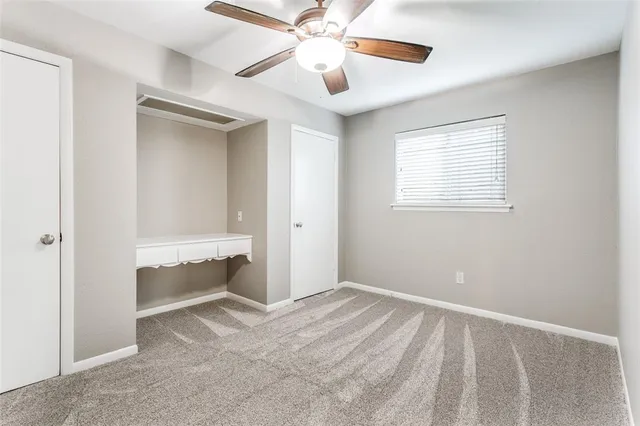 a bathroom with a sink a mirror and a shower
