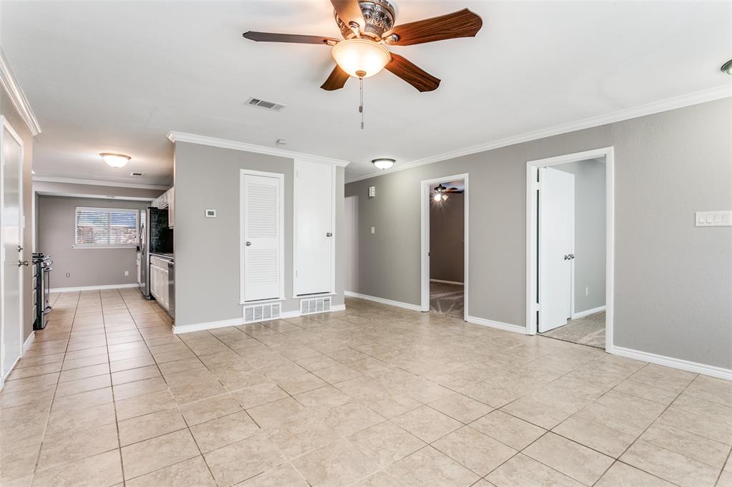 845 Lovers Lane Grapevine, TX 76051 - Photo 4 of 24 a view of a livingroom with a chandelier fan