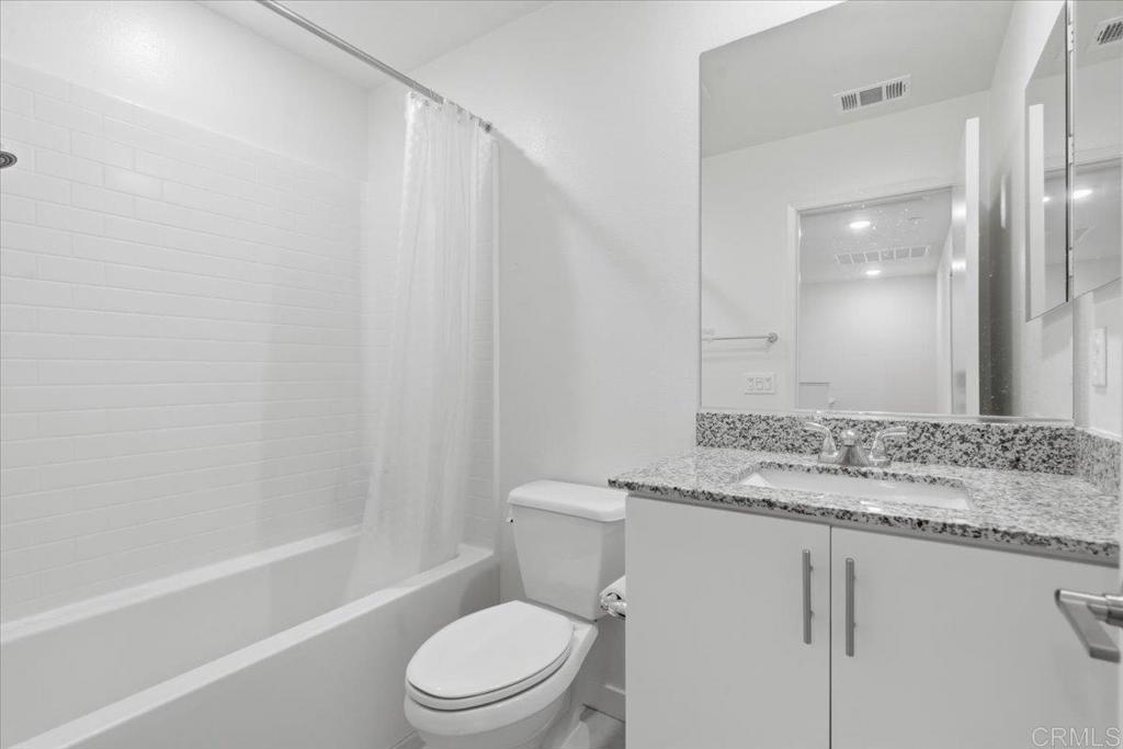 35180 Grove Trail Fallbrook, CA 92028 - Photo 11 of 23 a bathroom with a granite countertop sink toilet and shower