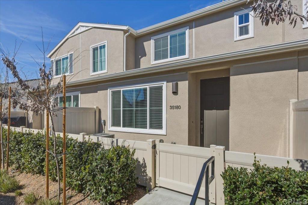 35180 Grove Trail Fallbrook, CA 92028 - Photo 2 of 23 front view of a house with a small yard