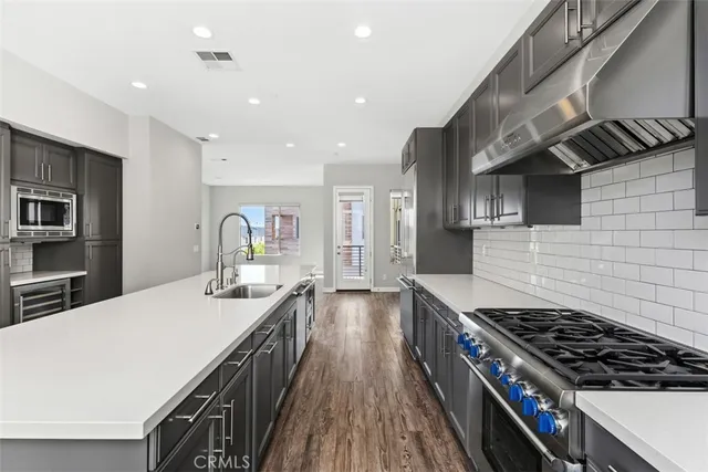 a view of a brick house with many windows