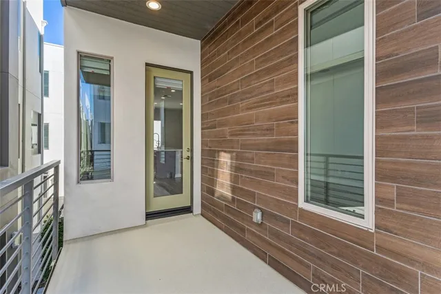 a bathroom with a sink mirror and toilet