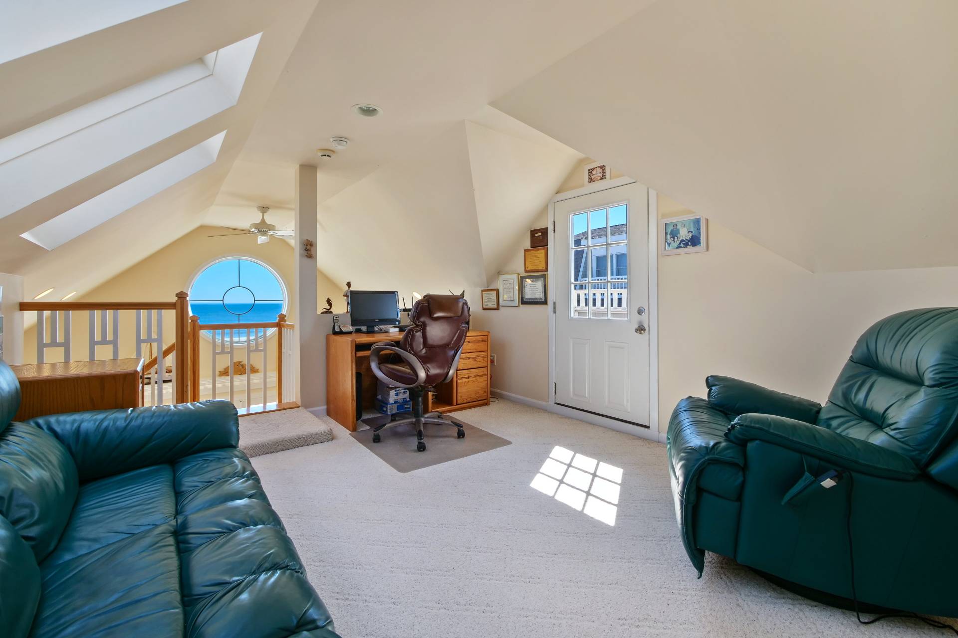 805 Dune Road Westhampton Beach, NY 11978 - Photo 13 of 25 a living room with furniture a couch and a chandelier