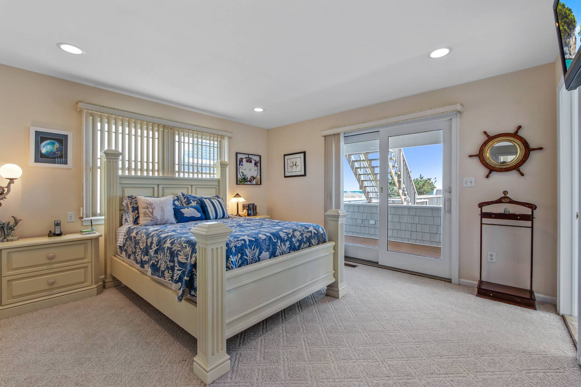 805 Dune Road Westhampton Beach, NY 11978 - Photo 15 of 25 a bedroom with a bed and a window