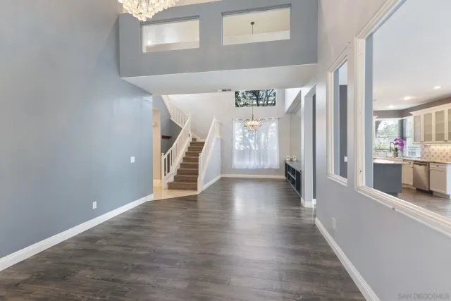 a view of livingroom with hardwood floor and ceiling fan