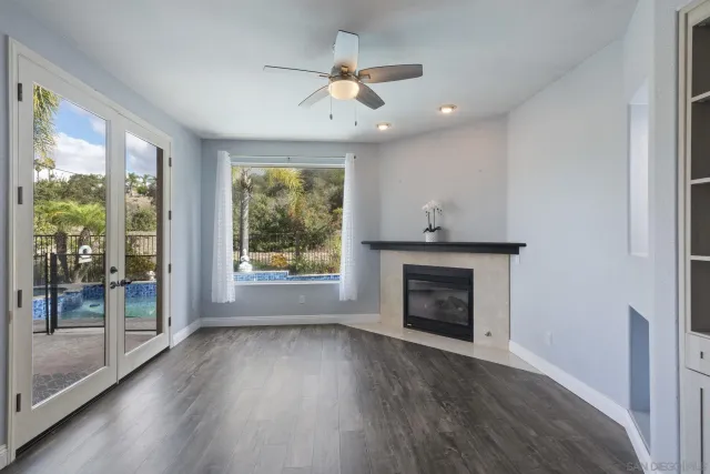 a kitchen with stainless steel appliances granite countertop a refrigerator sink and cabinets