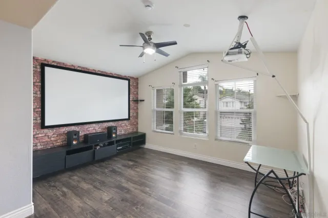 a backyard of a house with outdoor seating