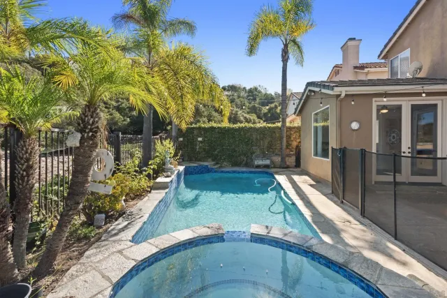 a view of a house with a swimming pool
