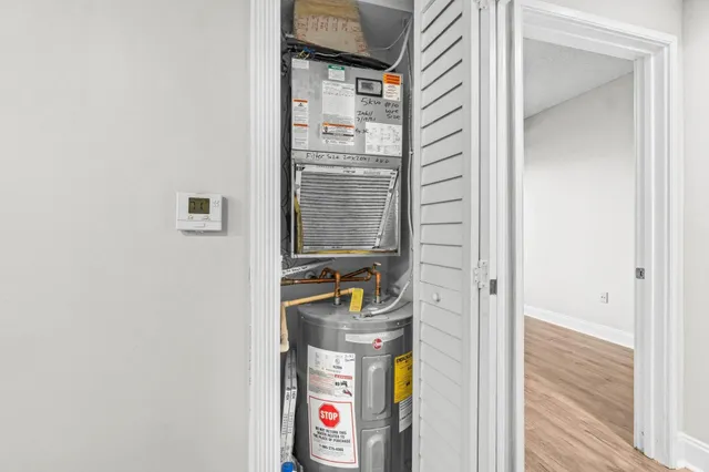 a bathroom with a door and a shower