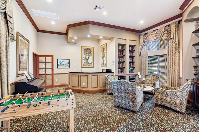 a living room with furniture and a table