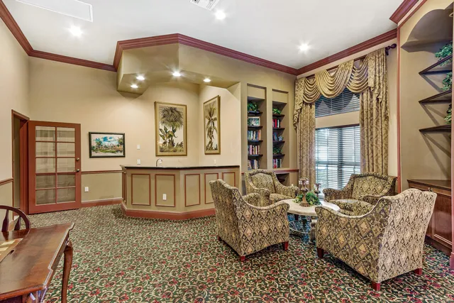 a living room with furniture and windows
