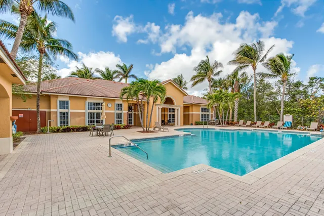 a view of a house with swimming pool