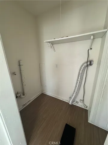 a view of a room with rack on the wall