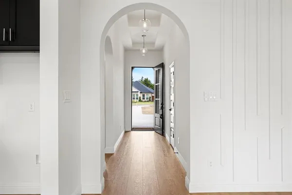 a view of a hallway view with staircase