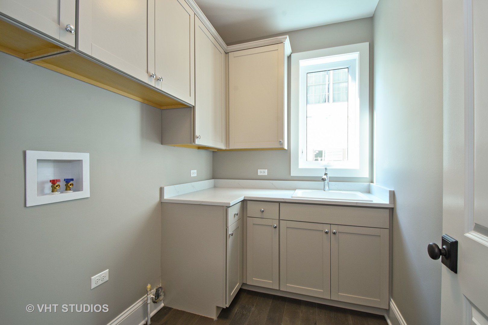 748 Prairie Avenue Barrington, IL 60010 - Photo 12 of 27 a room with a sink cabinets and a window