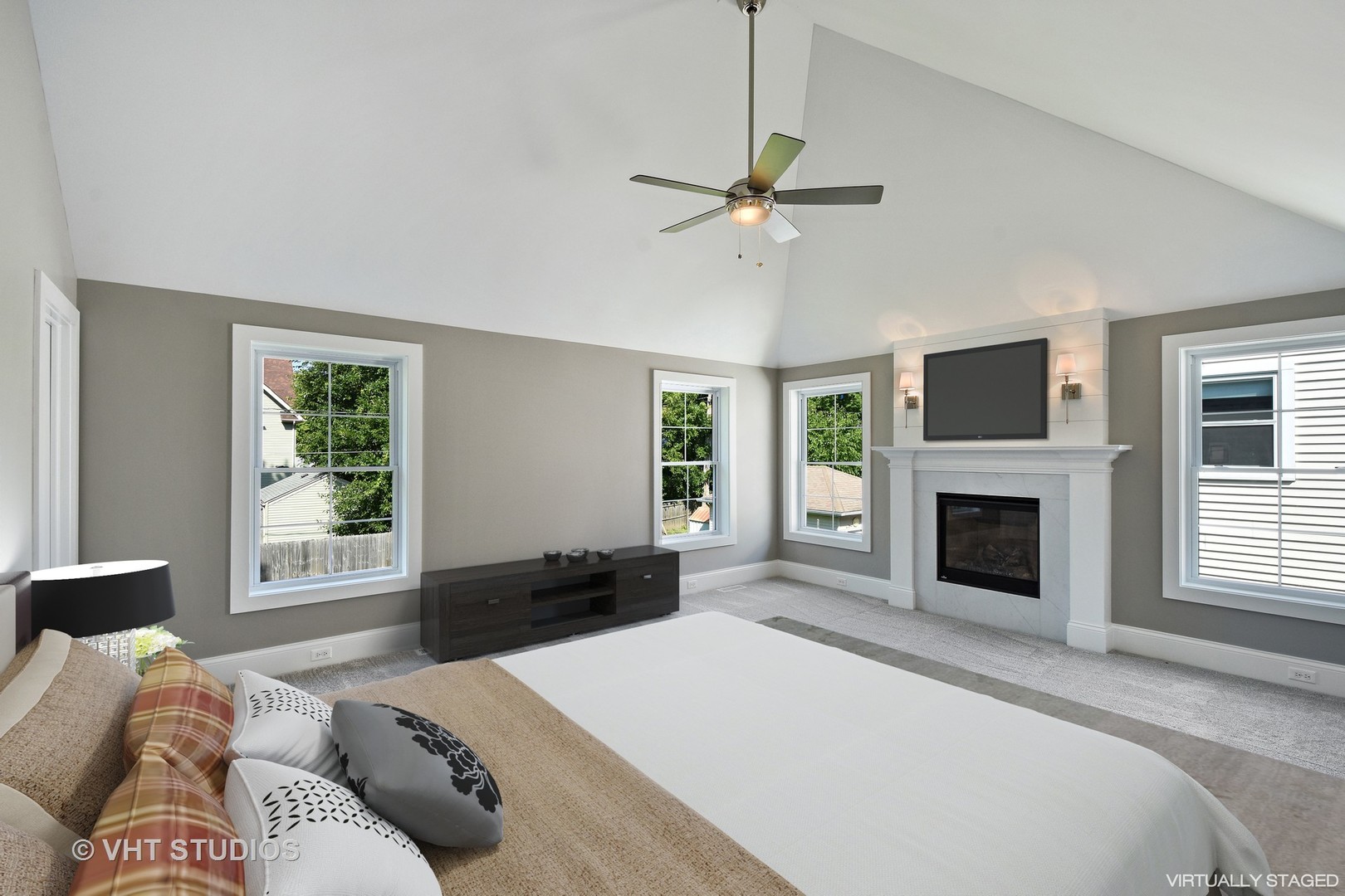 748 Prairie Avenue Barrington, IL 60010 - Photo 13 of 27 a bedroom with a bed and a fireplace