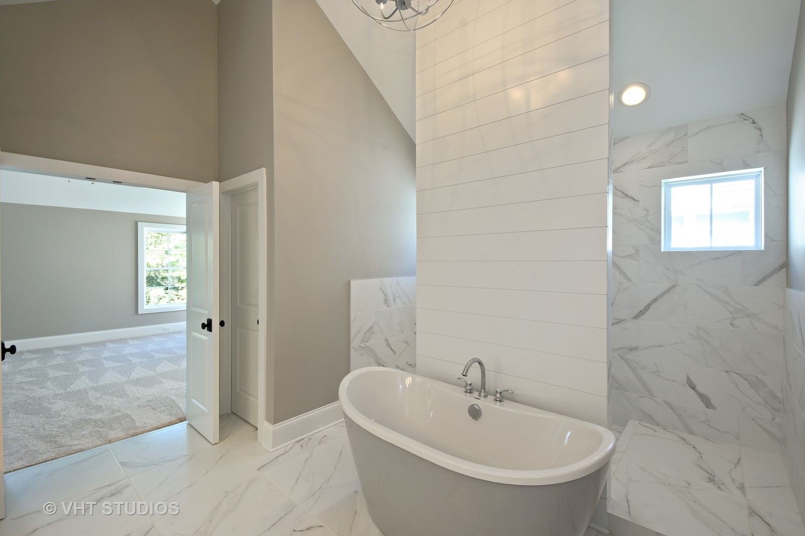 748 Prairie Avenue Barrington, IL 60010 - Photo 15 of 27 a bathroom with a sink and a bathtub