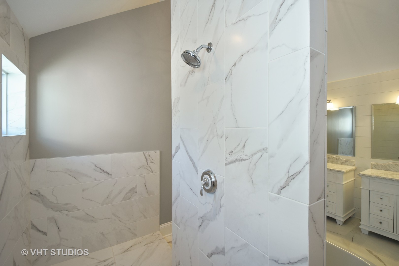 748 Prairie Avenue Barrington, IL 60010 - Photo 16 of 27 a bathroom with a bathtub and shower
