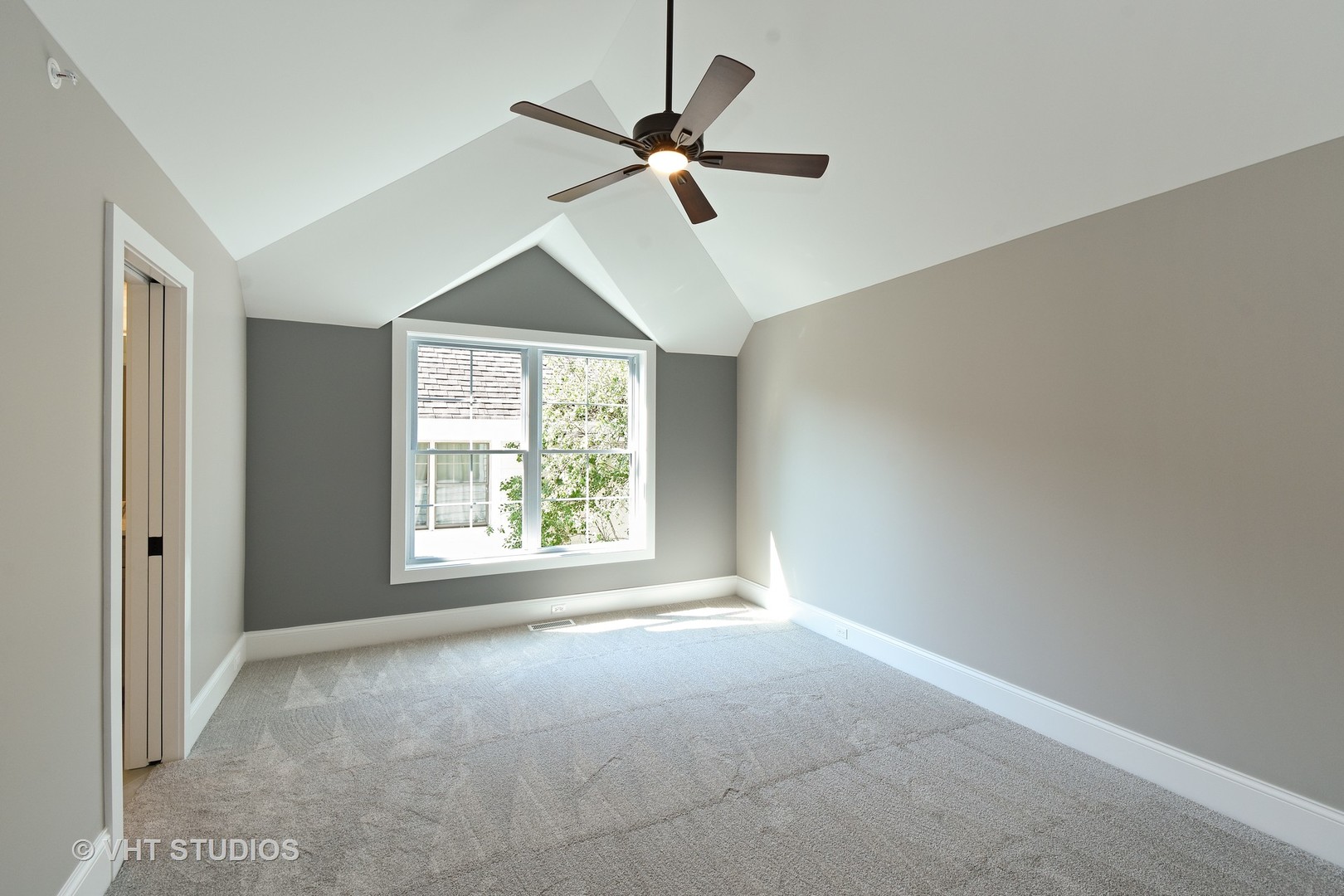748 Prairie Avenue Barrington, IL 60010 - Photo 18 of 27 a view of a livingroom with a ceiling fan and window