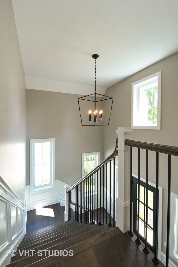 748 Prairie Avenue Barrington, IL 60010 - Photo 3 of 27 a view of a hallway with windows