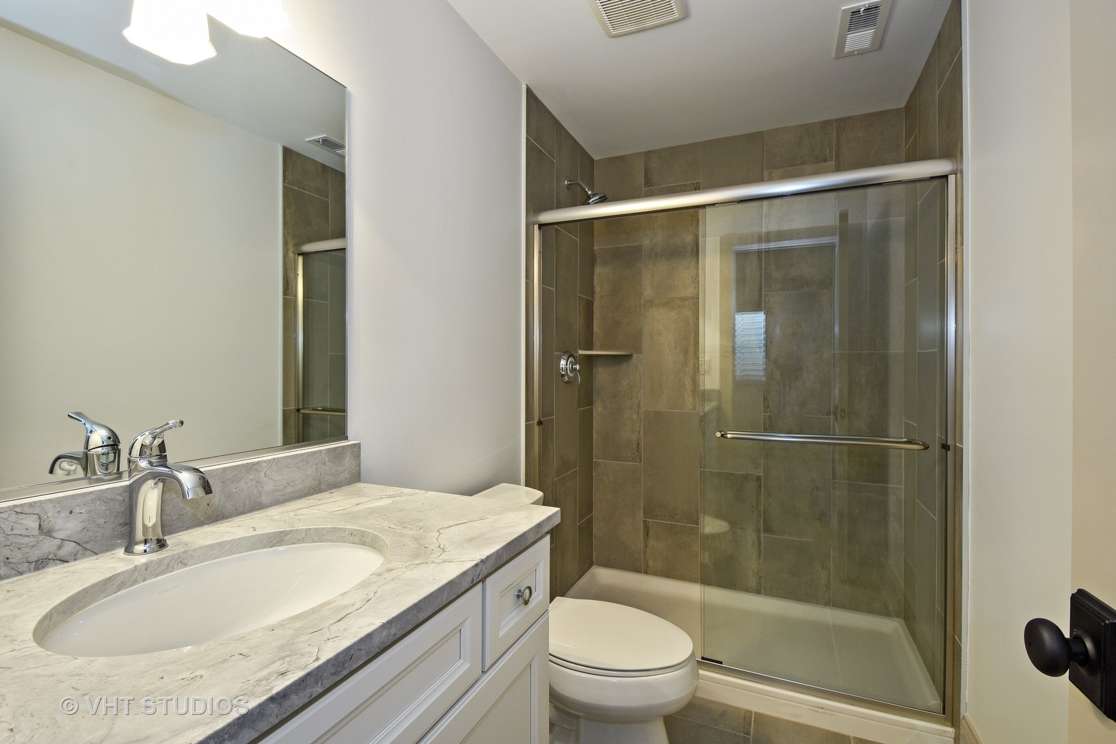 748 Prairie Avenue Barrington, IL 60010 - Photo 22 of 27 a bathroom with a granite countertop sink toilet and shower