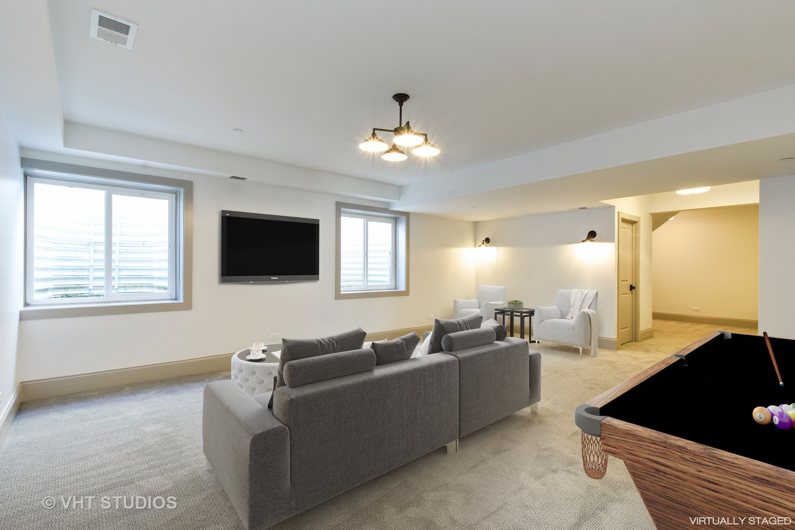 748 Prairie Avenue Barrington, IL 60010 - Photo 23 of 27 a living room with furniture and a flat screen tv