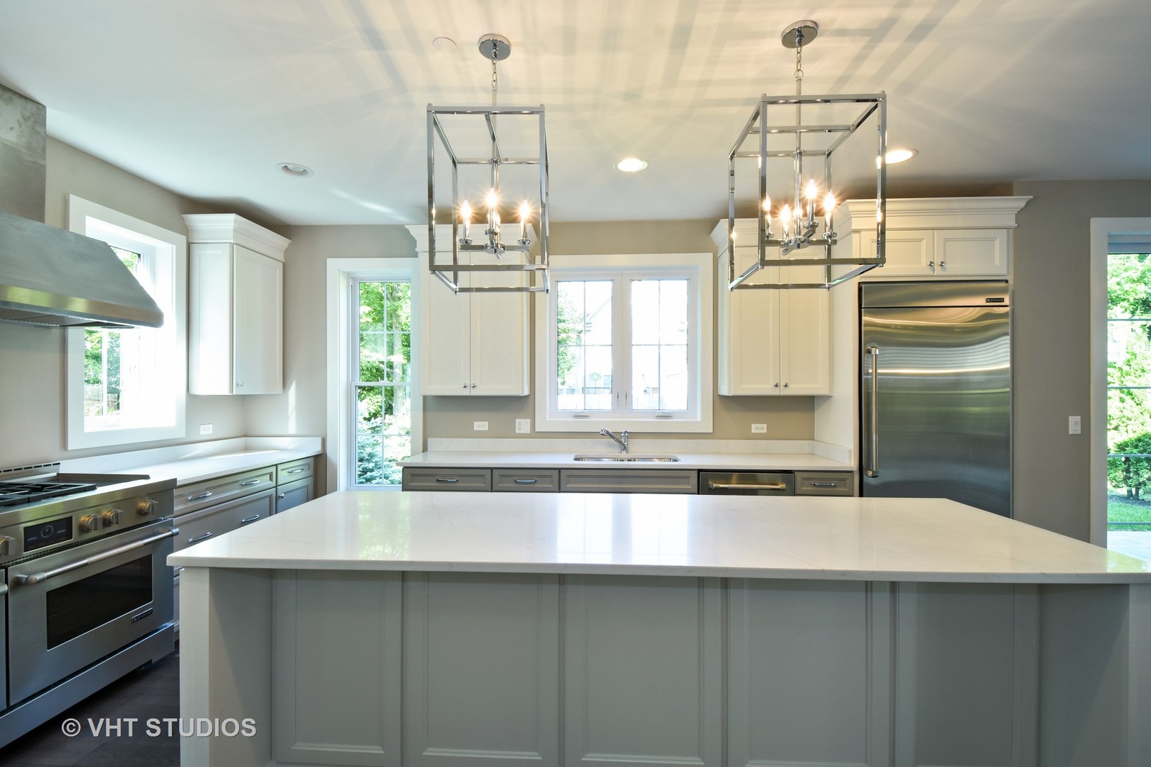 748 Prairie Avenue Barrington, IL 60010 - Photo 5 of 27 a kitchen with stainless steel appliances a sink stove and cabinets