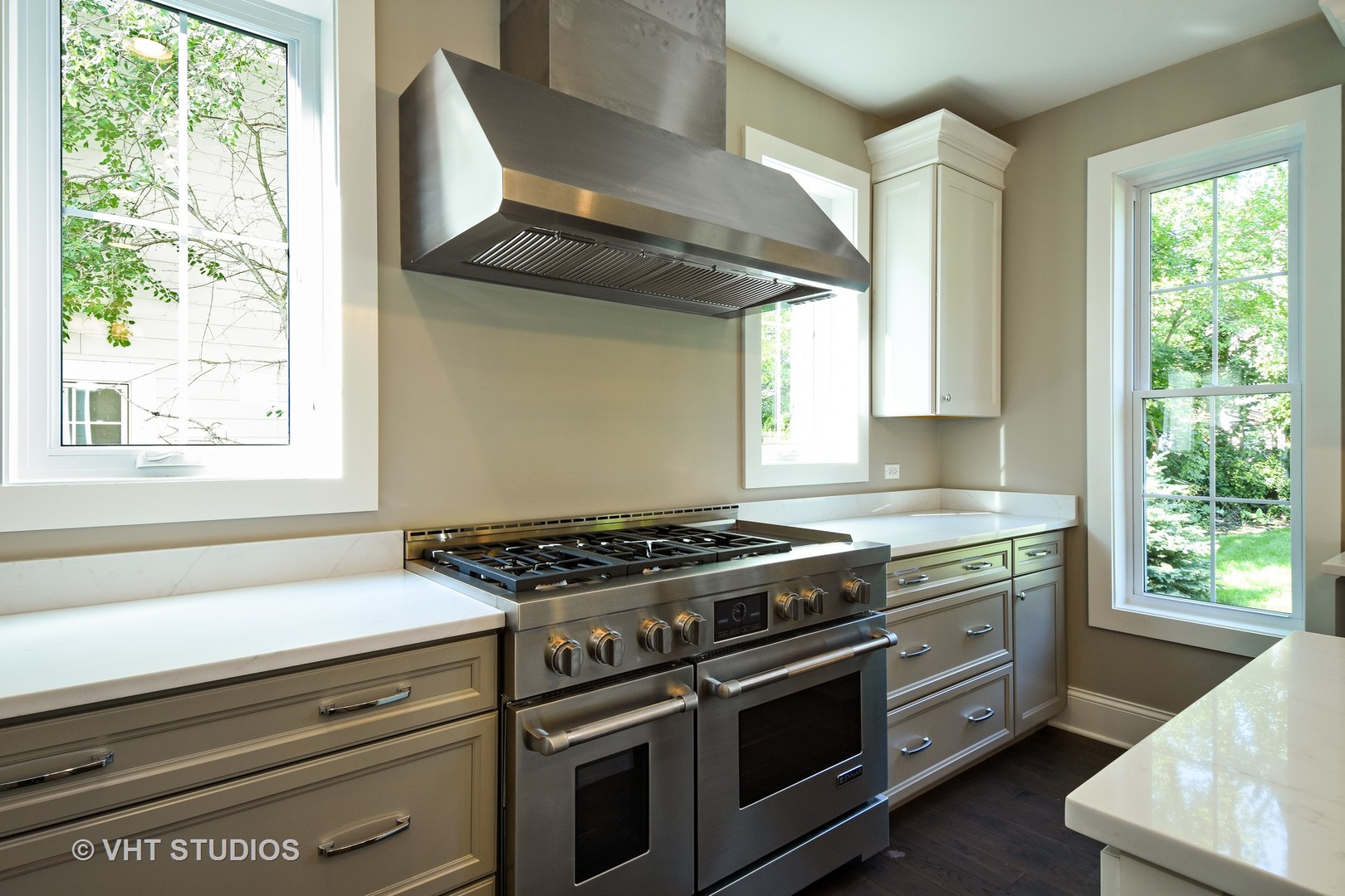 748 Prairie Avenue Barrington, IL 60010 - Photo 6 of 27 a kitchen with granite countertop a stove and a sink