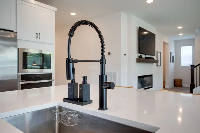 a view of living room with furniture and flat screen tv