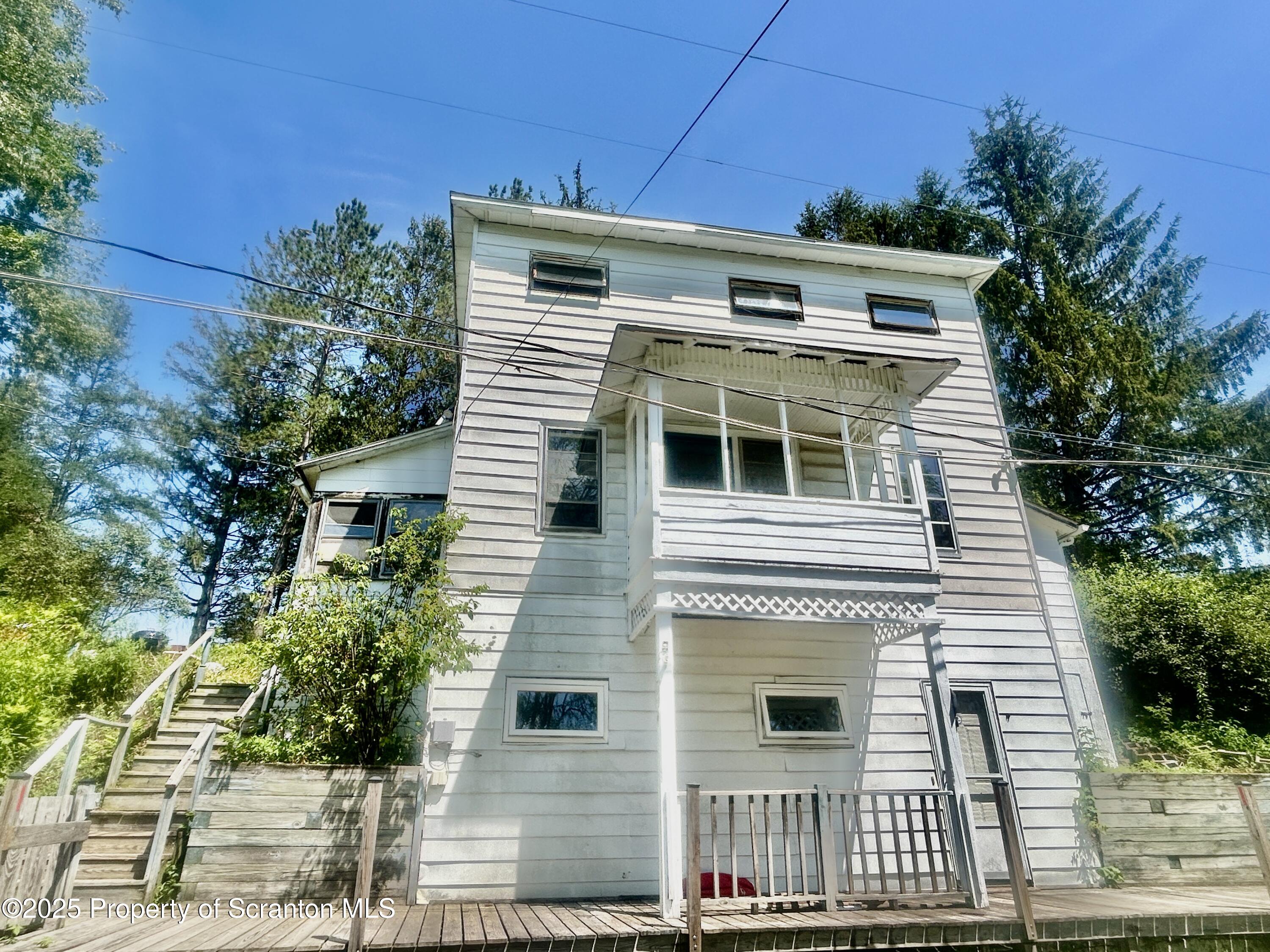 270 Starrucca Creek Road Starrucca, PA 18462 - Photo 1 of 51 a front view of a house with a yard