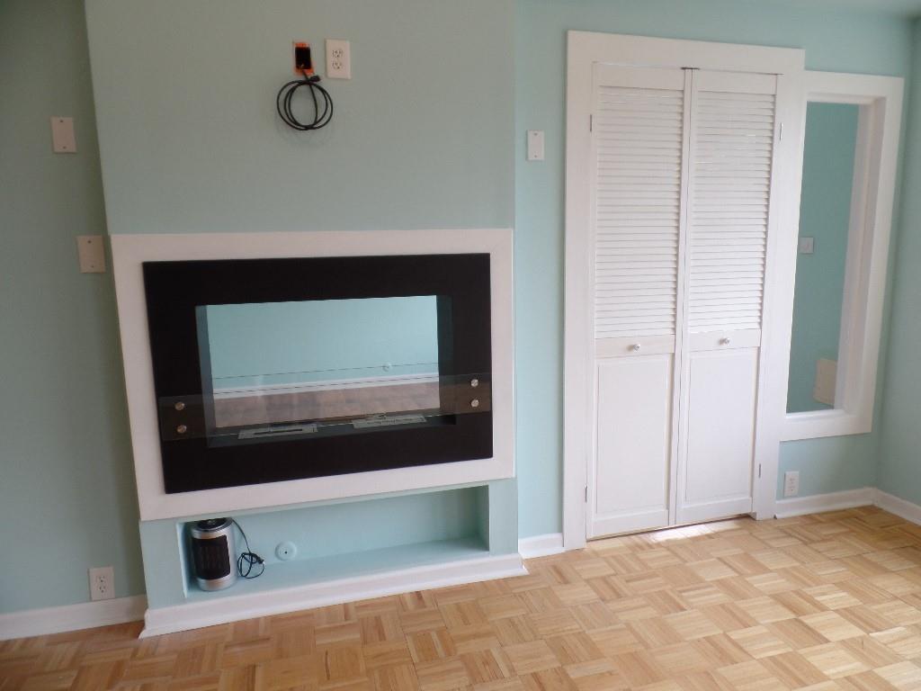 320 Fort Duquesne Boulevard, Unit 24M Pittsburgh, PA 15222 - Photo 8 of 40 a room with a fireplace