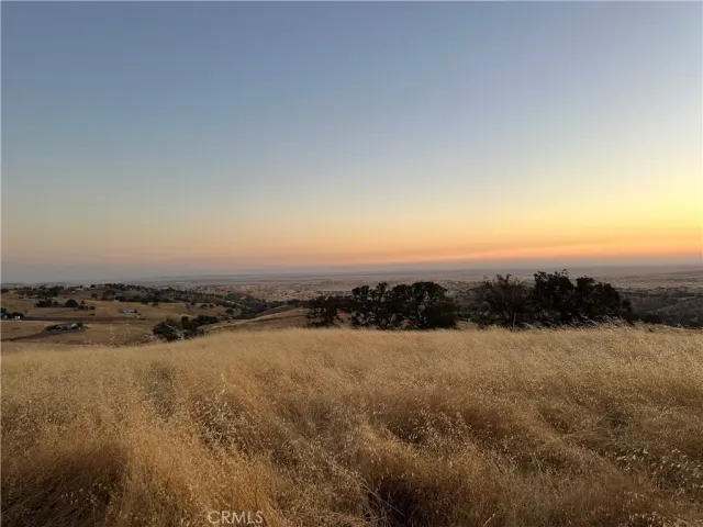 a view of lake with mountain in background