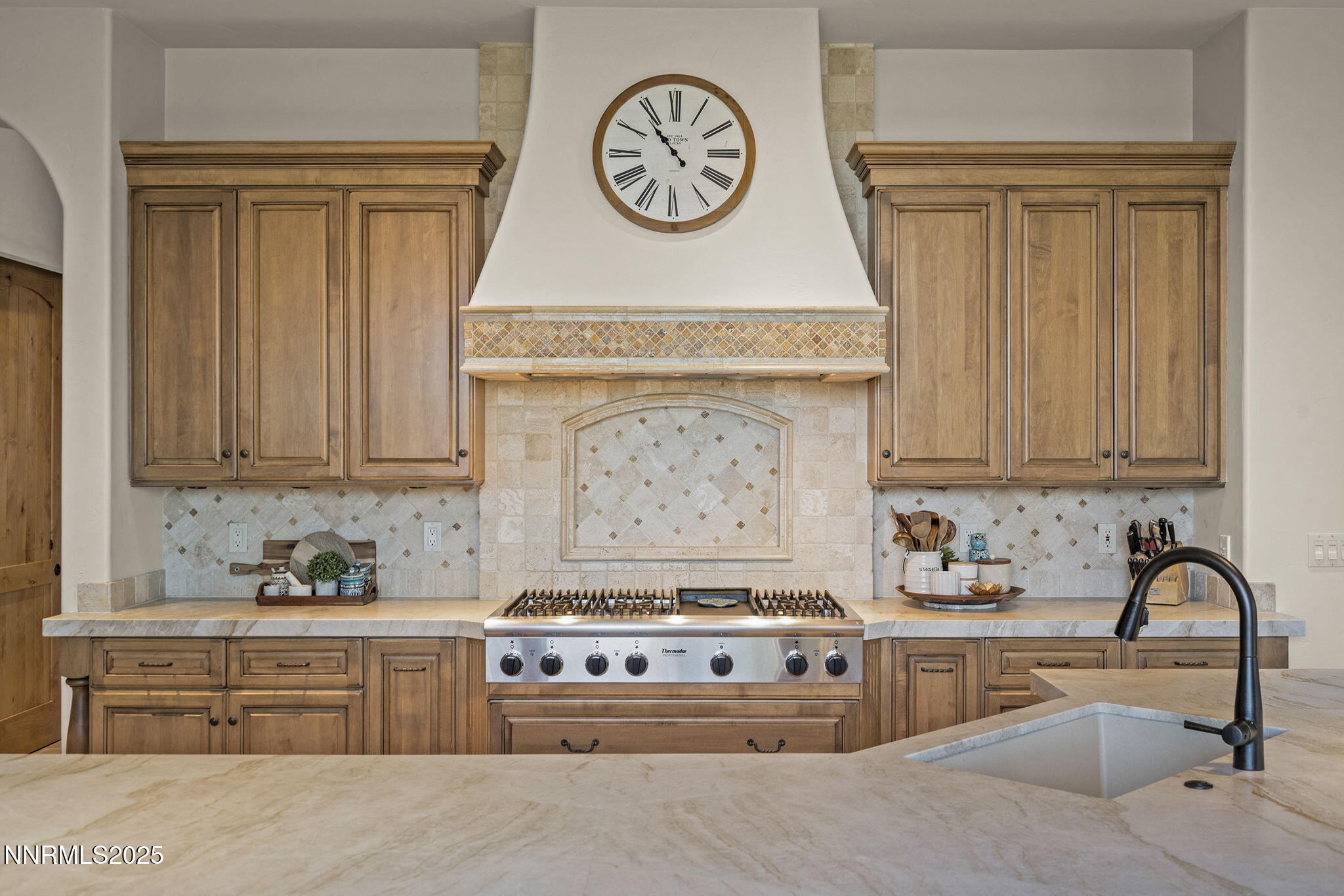 14220 Eagle Springs Court Reno, NV 89511 - Photo 18 of 57 a kitchen with stainless steel appliances granite countertop a stove and a sink