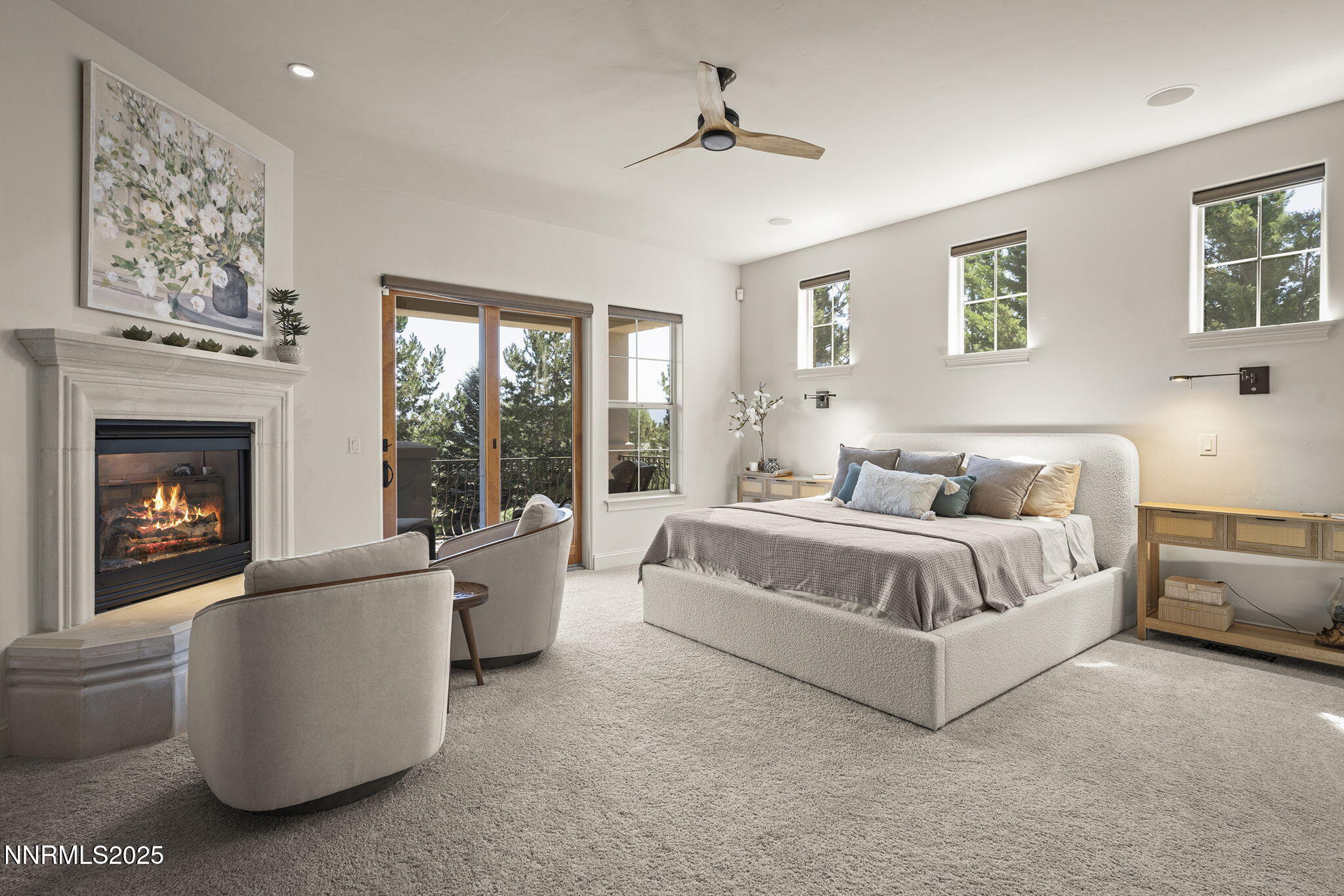 14220 Eagle Springs Court Reno, NV 89511 - Photo 27 of 57 a spacious bedroom with a large bed and a couch