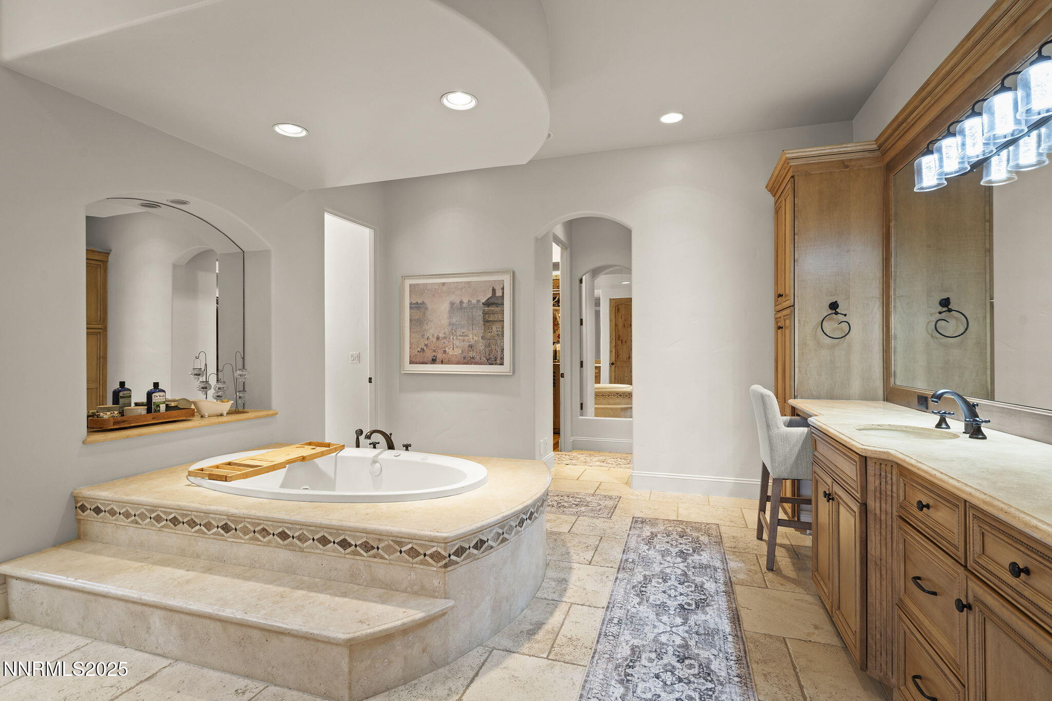 14220 Eagle Springs Court Reno, NV 89511 - Photo 29 of 57 a spacious bathroom with a tub double sink and a mirror