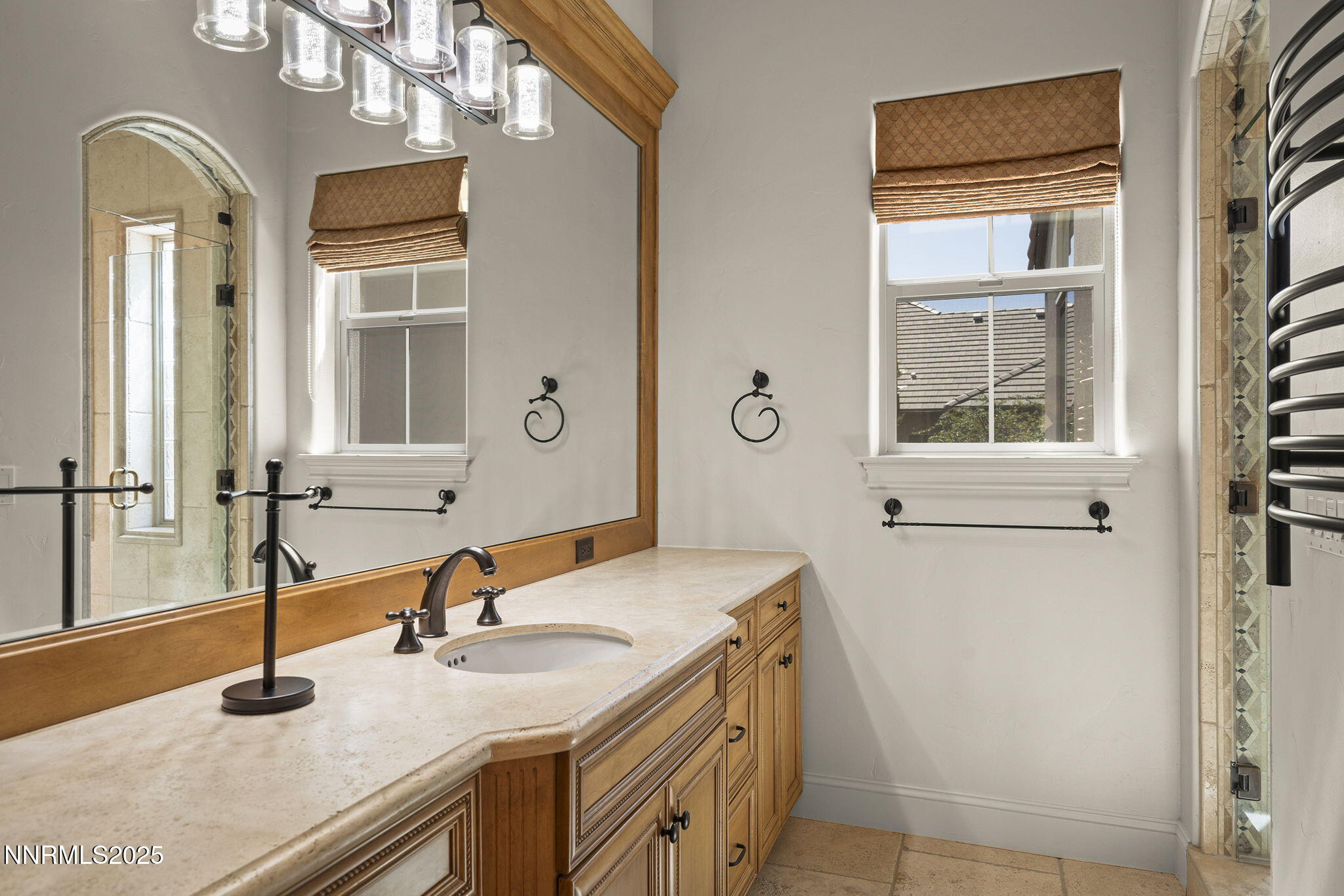14220 Eagle Springs Court Reno, NV 89511 - Photo 32 of 57 a bathroom with a sink double vanity