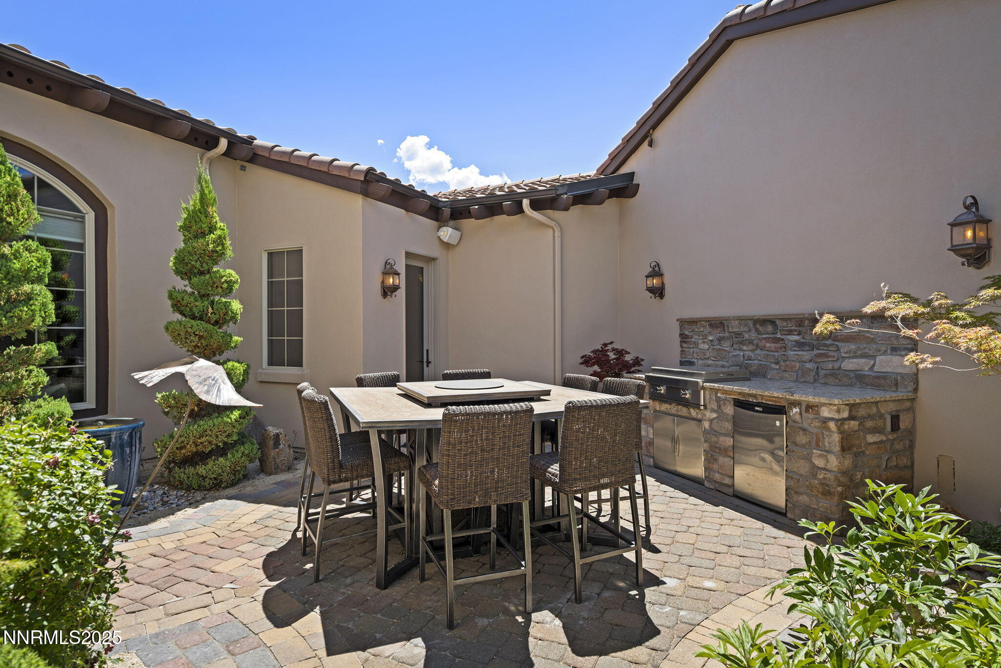 14220 Eagle Springs Court Reno, NV 89511 - Photo 46 of 57 a view of a dinning table and chairs in the patio