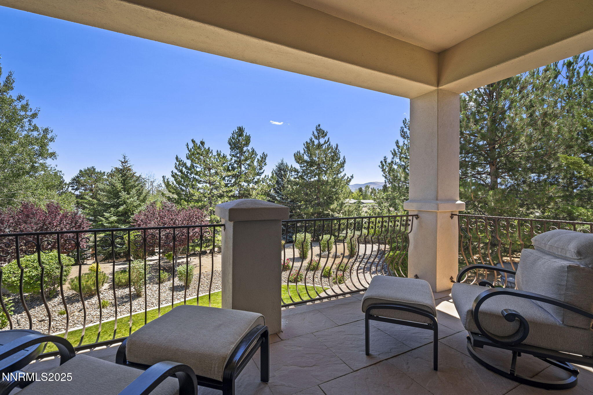 14220 Eagle Springs Court Reno, NV 89511 - Photo 48 of 57 a view of a balcony with chair and wooden floor