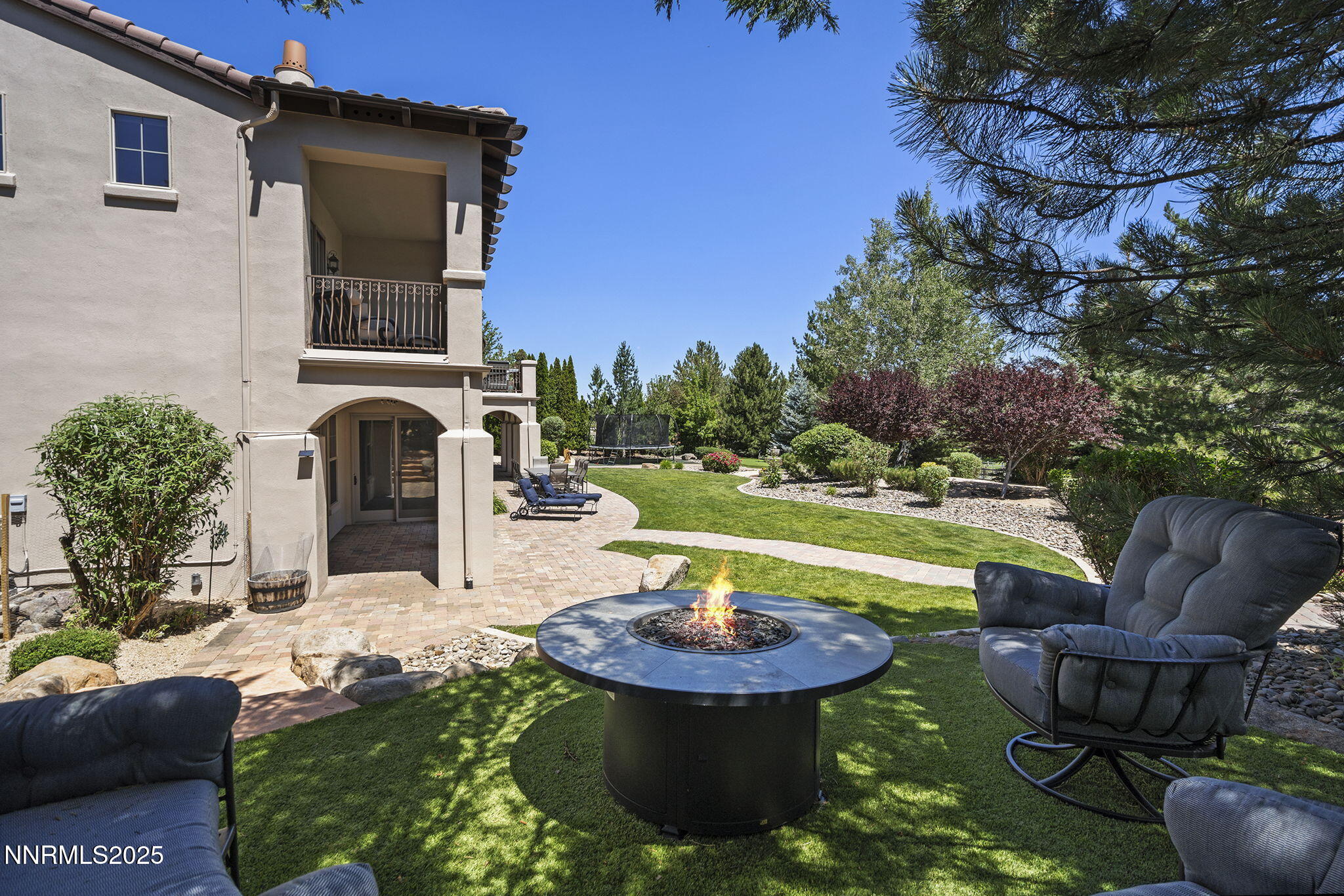 14220 Eagle Springs Court Reno, NV 89511 - Photo 50 of 57 a view of a swimming pool with back yard of a house