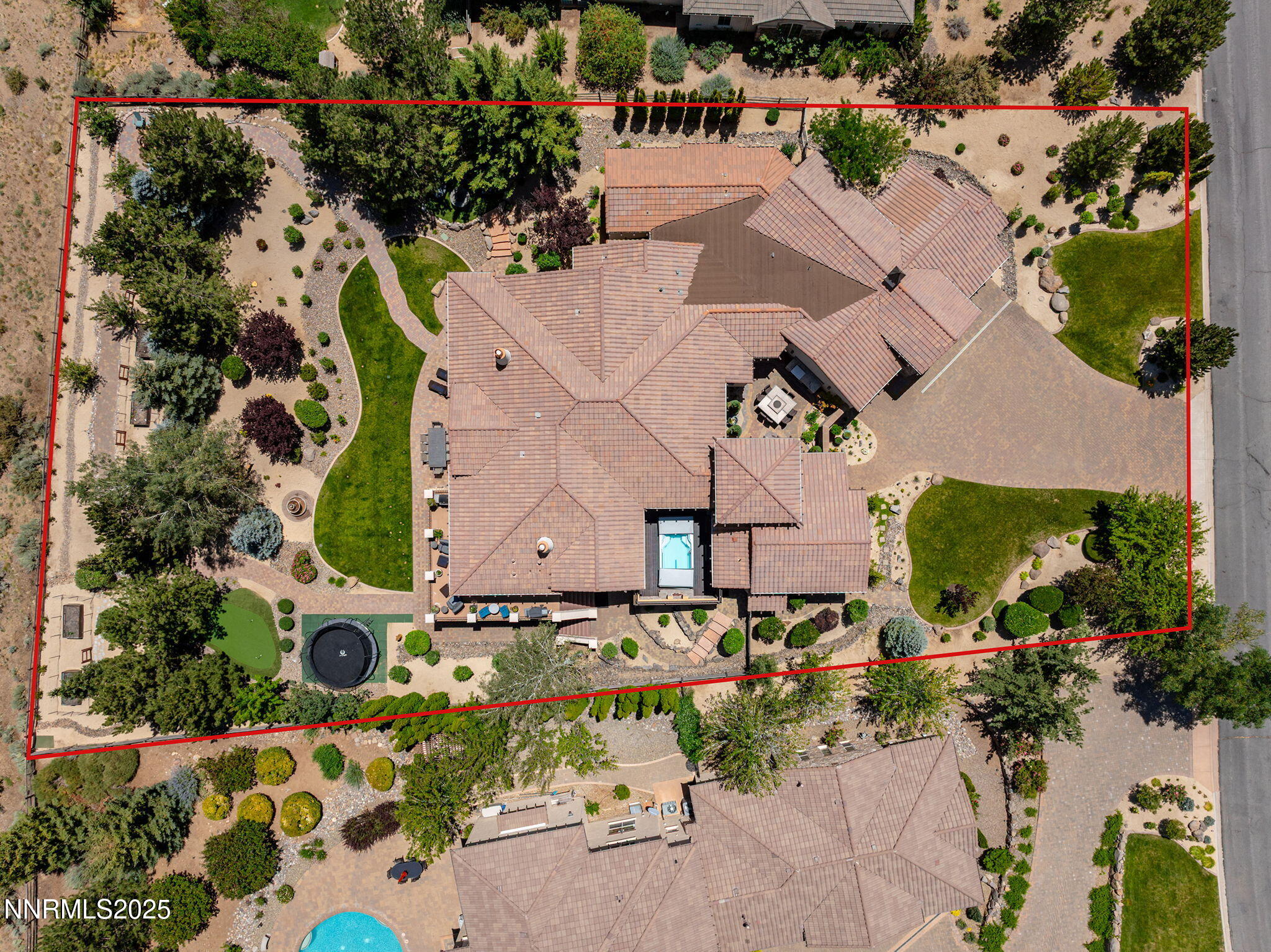 14220 Eagle Springs Court Reno, NV 89511 - Photo 57 of 57 an aerial view of a house with a yard and a large tree