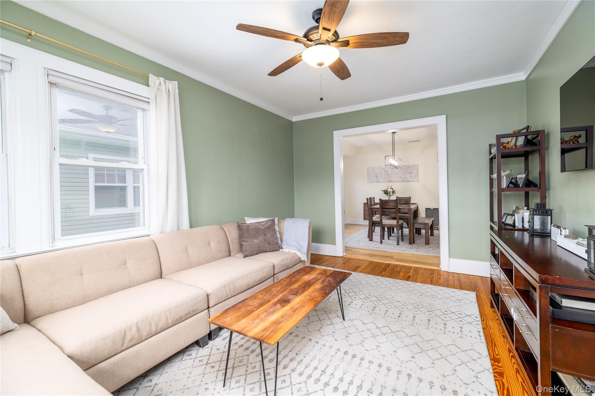 3016 Roxbury Road Oceanside, NY 11572 - Photo 7 of 24 a living room with furniture and a window