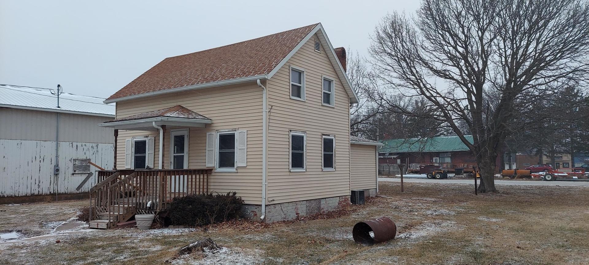 506 State Street New Windsor, IL 61465 - Photo 2 of 10 a view of a house with a yard